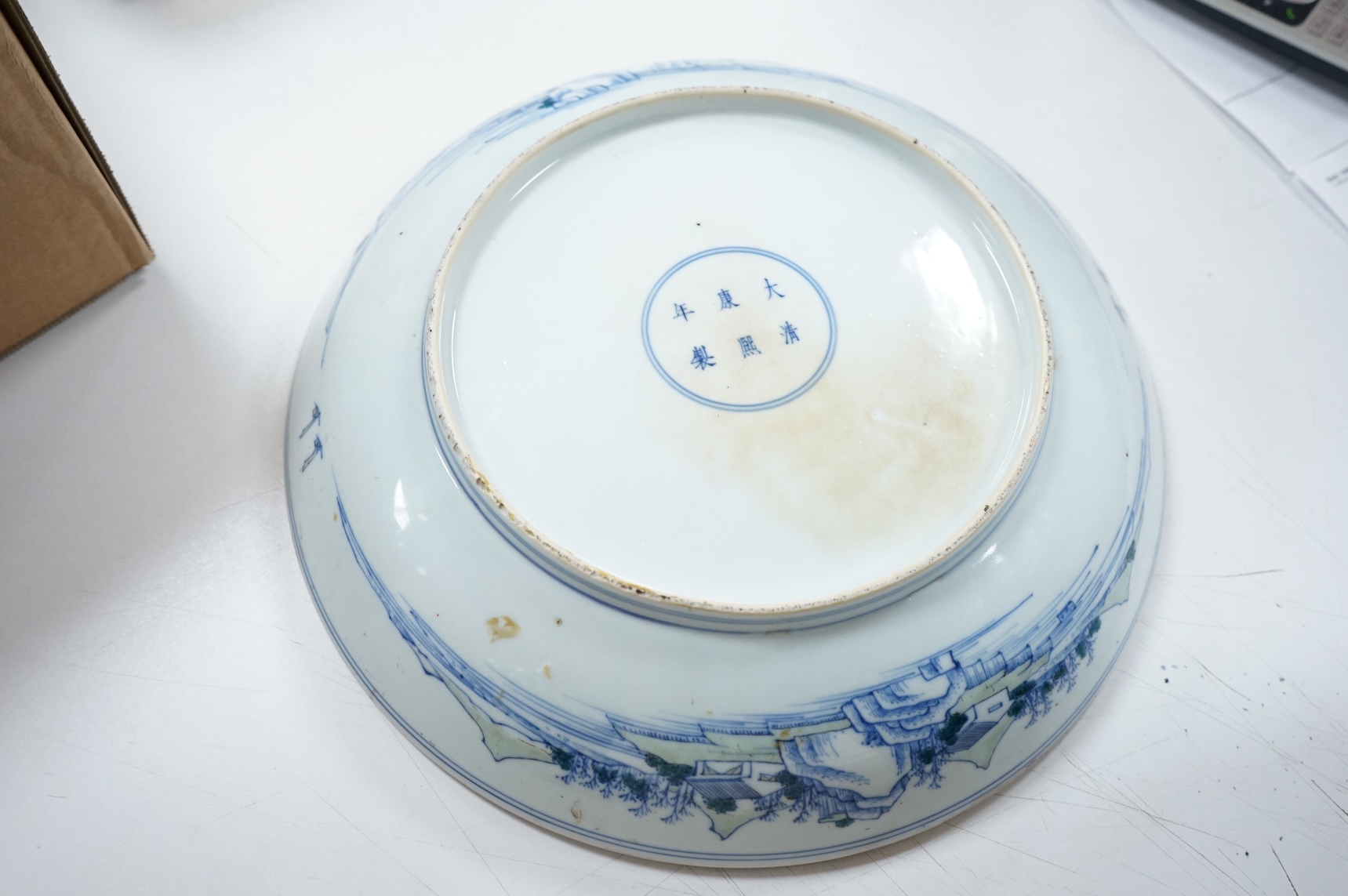 A Chinese inscribed doucai landscape charger, Kangxi mark, possibly Republic period, 33cm